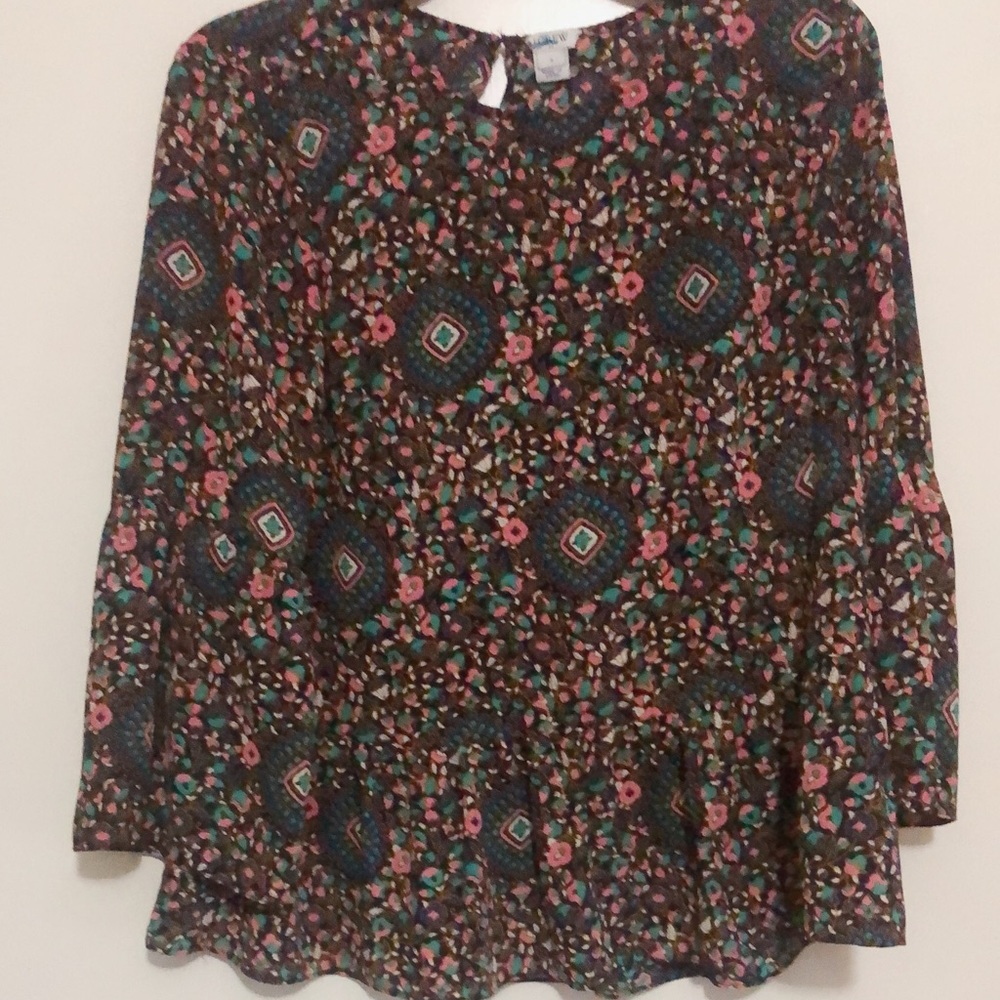 J. Crew print top with ruffle hem.